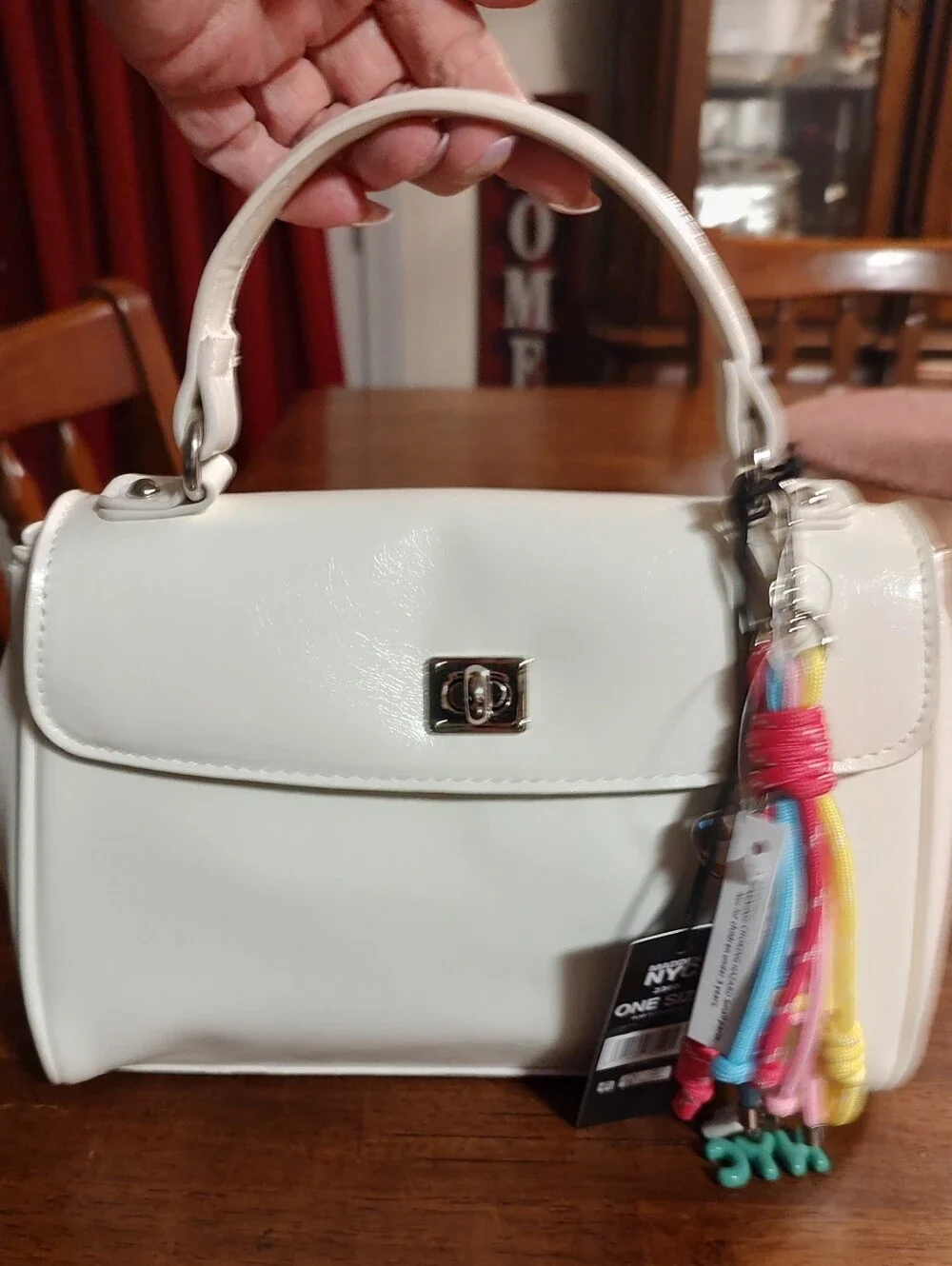 White Top-Handle Women’s Bag with Colorful Tassel